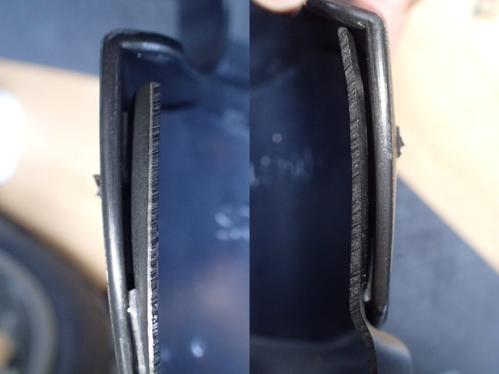 Extreme close-up cross-section showing a small gap and lift on the plastic joint due to the un-repositionable strong tape.