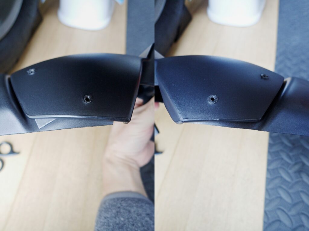 A comparison photo showing a slight misalignment and gap on the left edge of the attached motorcycle fender extension.