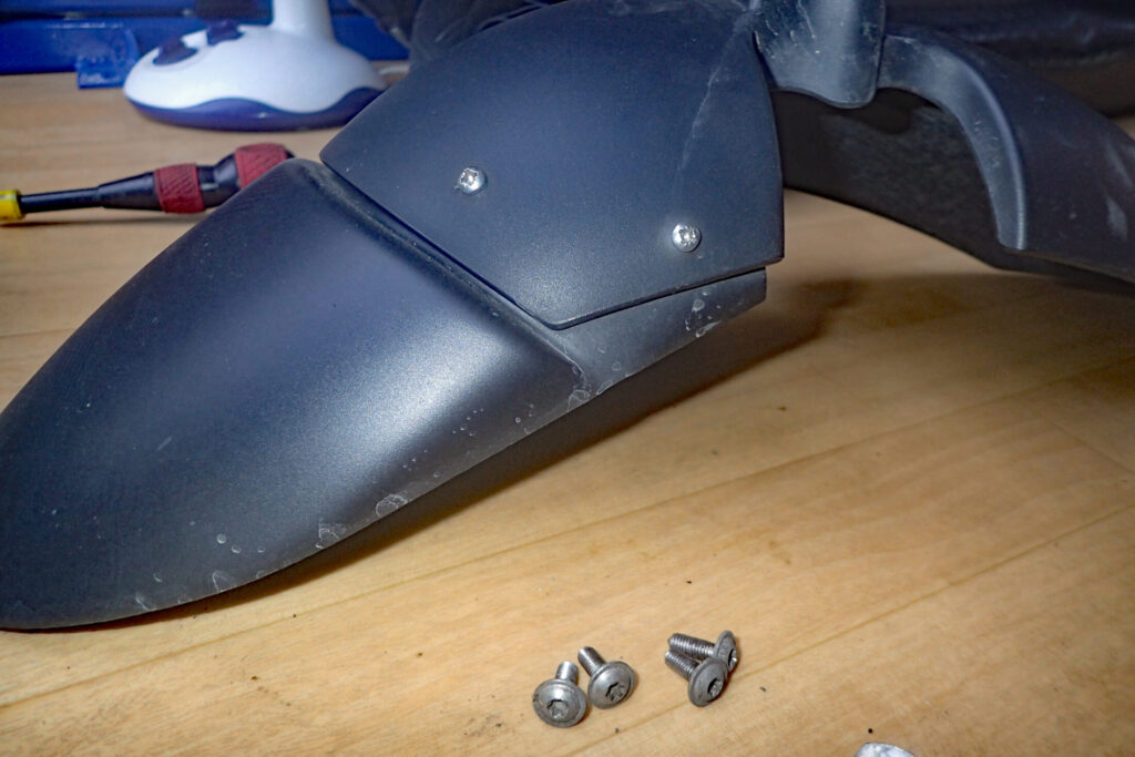 Right side view of the BMW G650GS front fender assembly, illustrating the uneven gap between the fender and the extender extension.