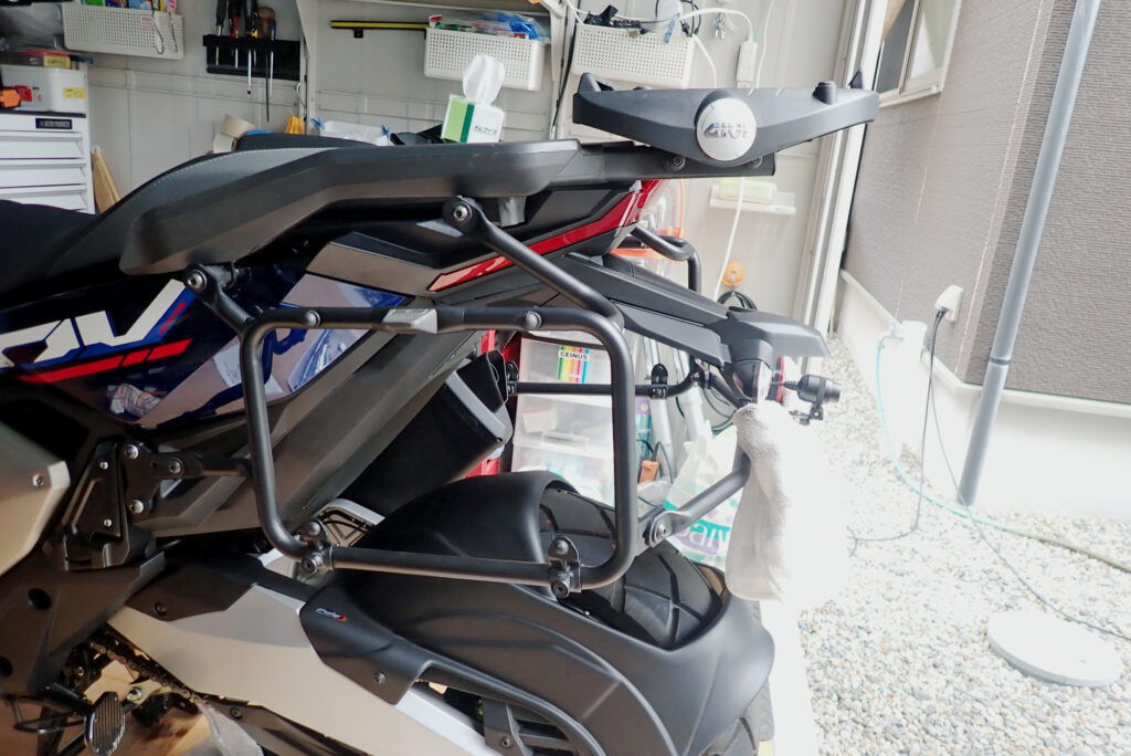 Left side view of GIVI PLO1188MK side case holder fully tightened on Honda X-ADV
