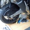Full right-side profile of a Honda X-ADV with the Puig rear splash guard fully installed, enhancing mud protection and aesthetics.