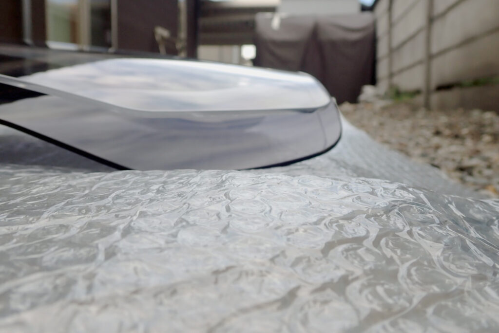Curved and flipped up top edge of aftermarket windscreen for Honda X-ADV