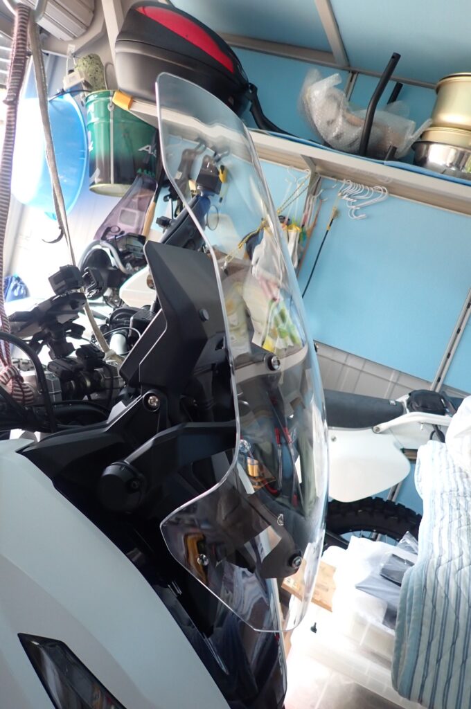 Side profile view of Honda X-ADV OEM stock windscreen