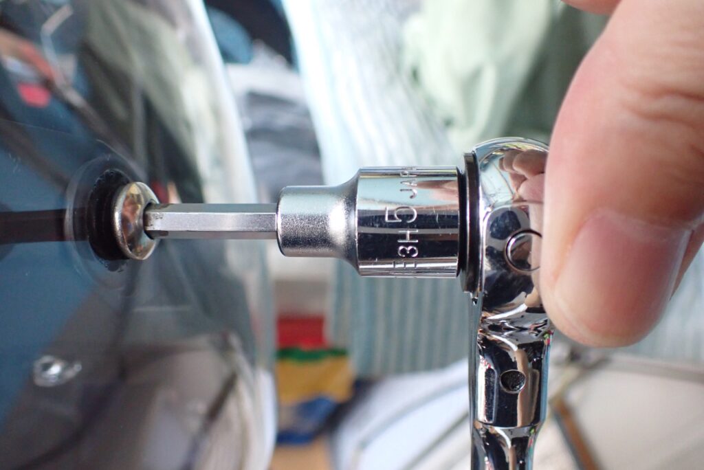 Removing Honda X-ADV windscreen with 5mm hex socket ratchet wrench