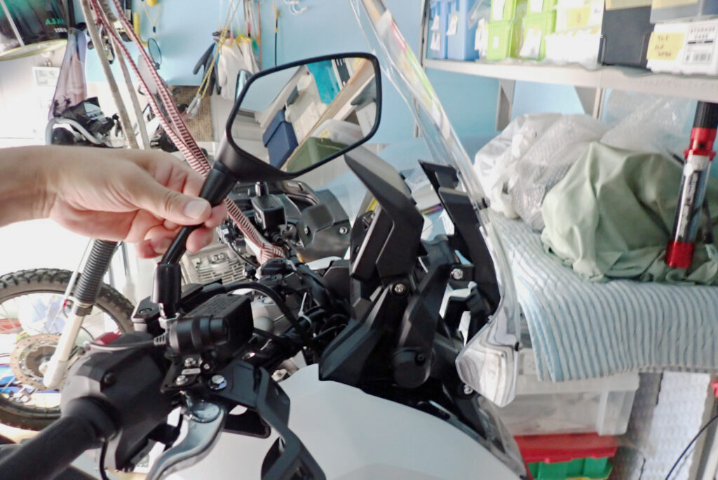 Removing the right rearview mirror from Honda X-ADV handlebar mount