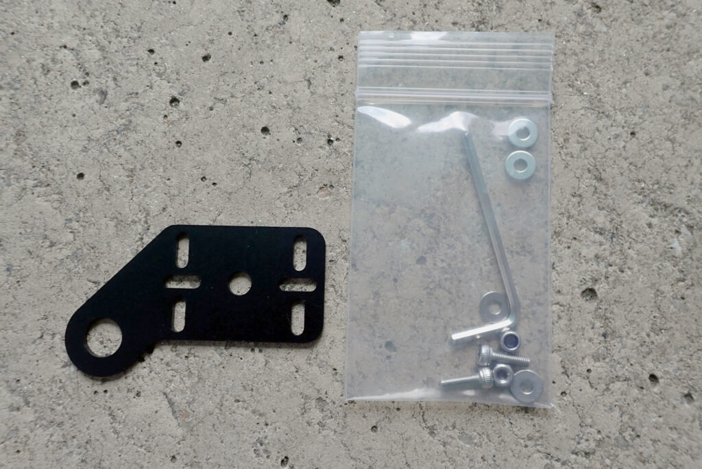 Unboxing Kaedear KDR-YX401 motorcycle dashcam mirror mount bracket with bolts and hex wrench