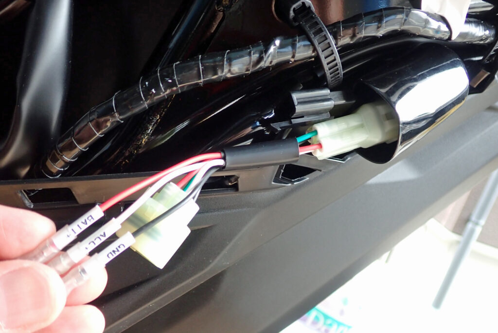 Kitaco Honda ACC power extraction harness installed showing bullet terminals