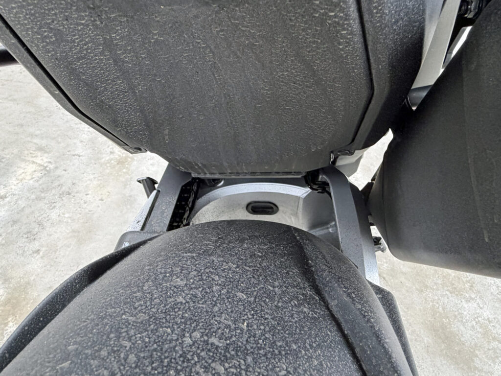 Puig splash guard and undertail blocking coarse sand and gravel from rear shock absorber