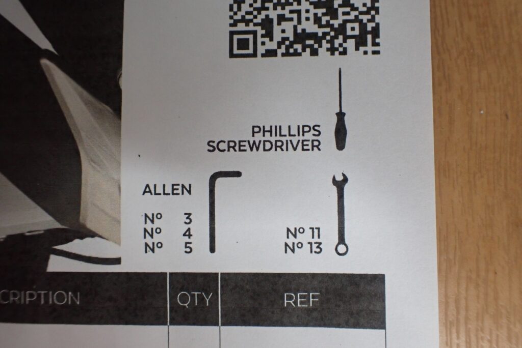 Puig instruction manual page showing required tools including Phillips screwdriver, Allen keys 3/4/5mm, and spanners 11/13mm.