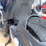 Chain side view of Puig splash guard showing fine mist dirt pattern after 400km ride