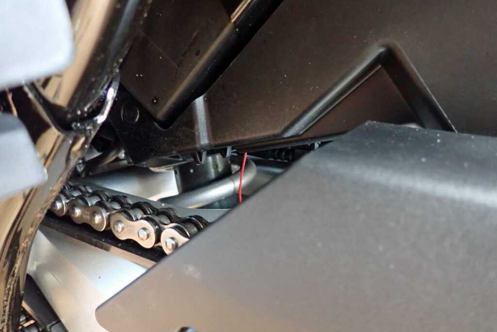 Routing ACC wire past rear shock absorber area on Honda X-ADV