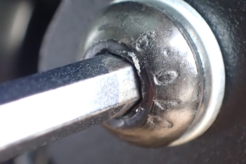 TONE hex bit socket inserted in bolt recess showing chamfer gap and loose fit
