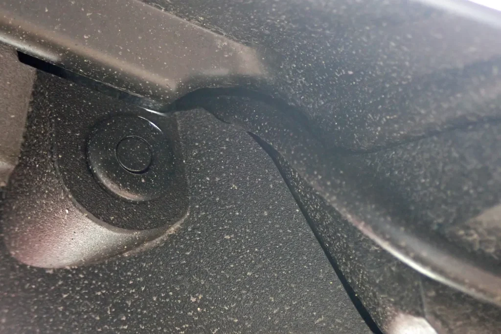 Close-up of custom cut opening for routing rear camera cable