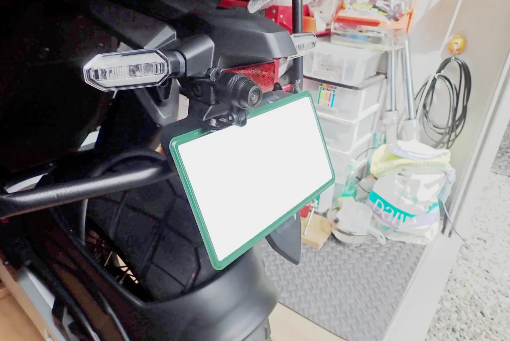 Left-side view of rear camera mounting position on motorcycle