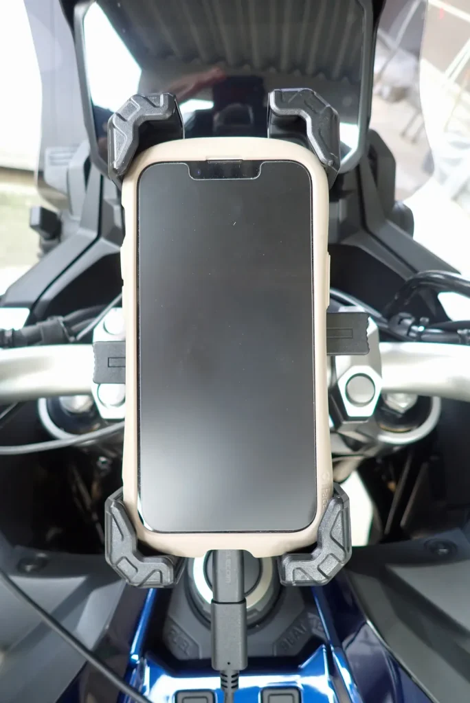 iPhone 13 mini with rugged hybrid case held securely in Kaedear mount