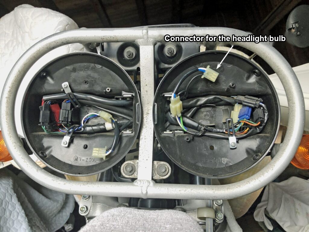 Inside the BAJA's twin headlight shells after removing the lens units